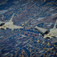 Illustration for article titled These Shots Of Fulcrums and Eurofighters Over Lithuania Are Amazing